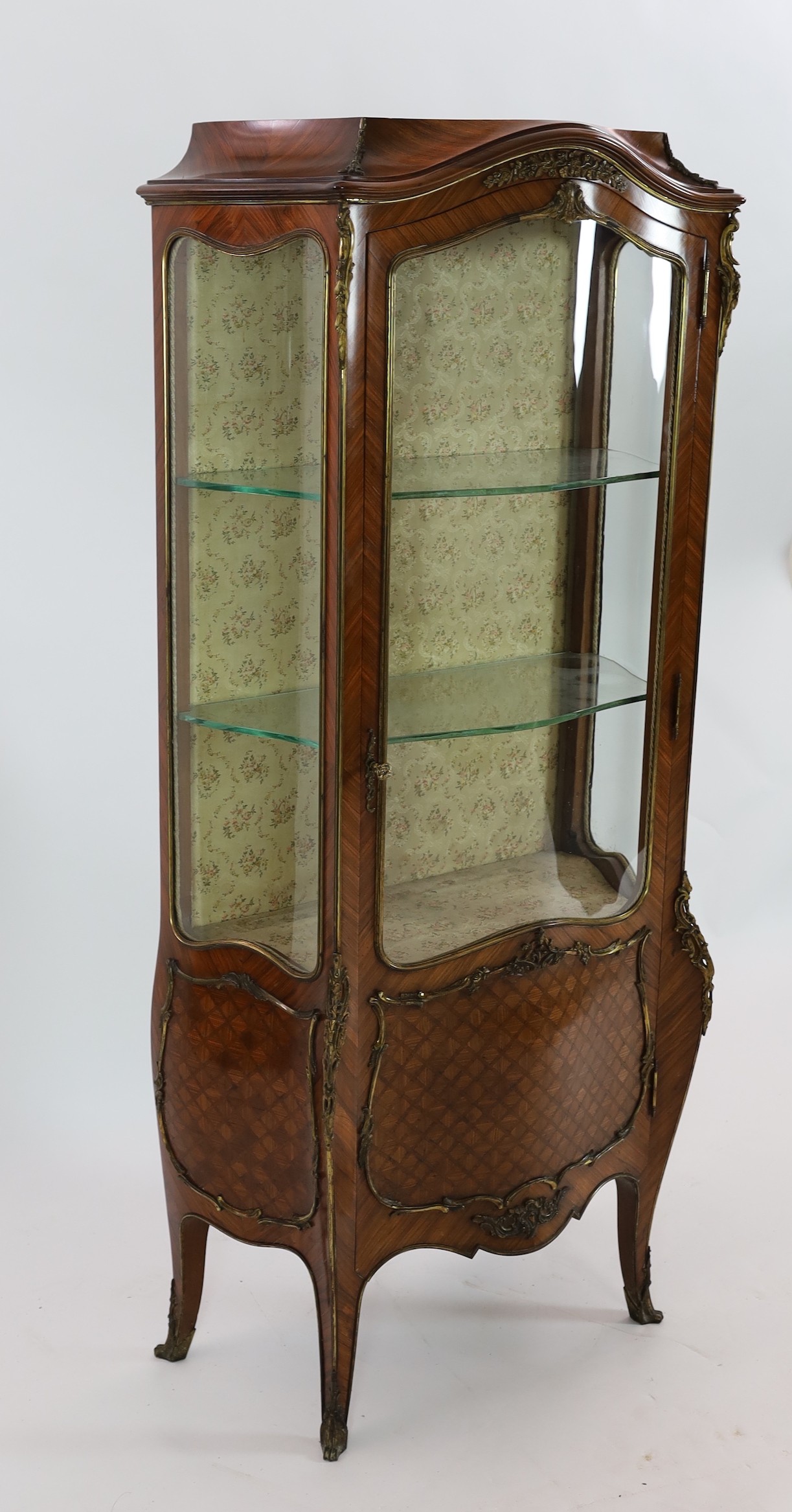 An early 20th century French ormolu mounted kingwood and parquetry vitrine, width 70cm, depth 40cm, height 169cm